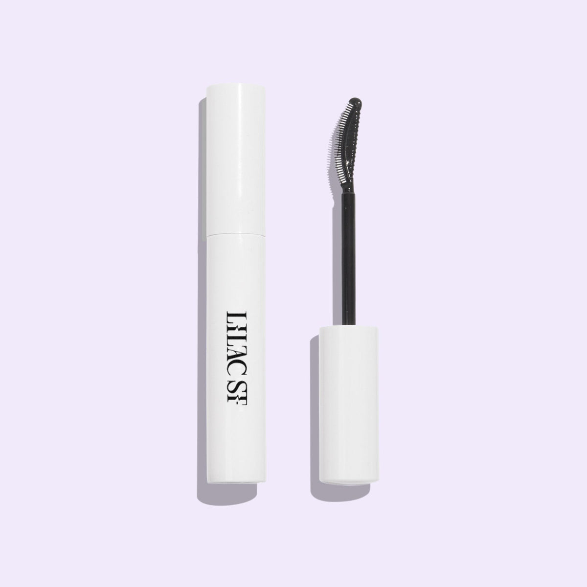 Lilac St. Ciao for Now lash remover displaying the container and the applicator brush next to each other