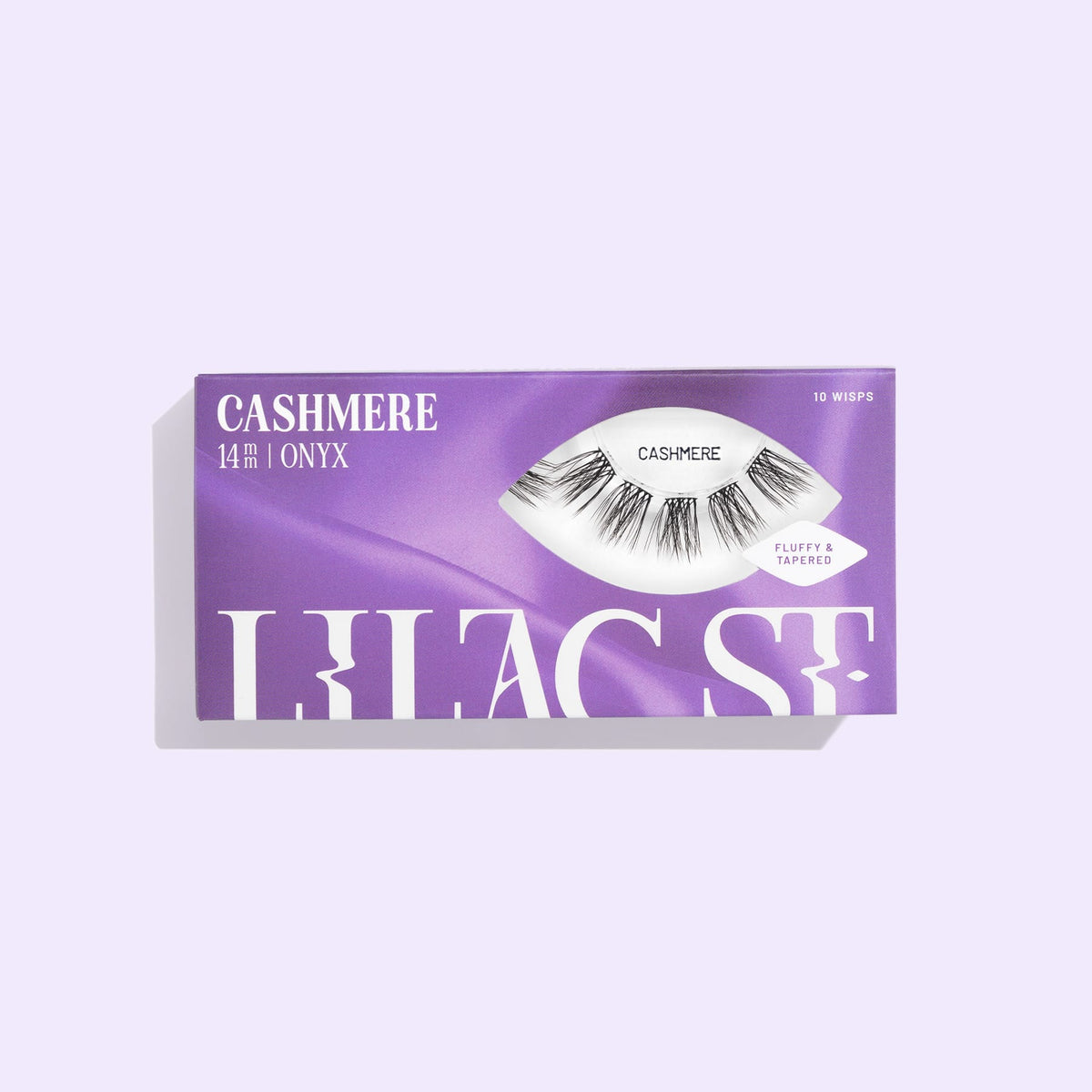 Cashmere Lashes by Lilac St. shown in their packaging. Fluffy & Tapered. 10 Wisps.