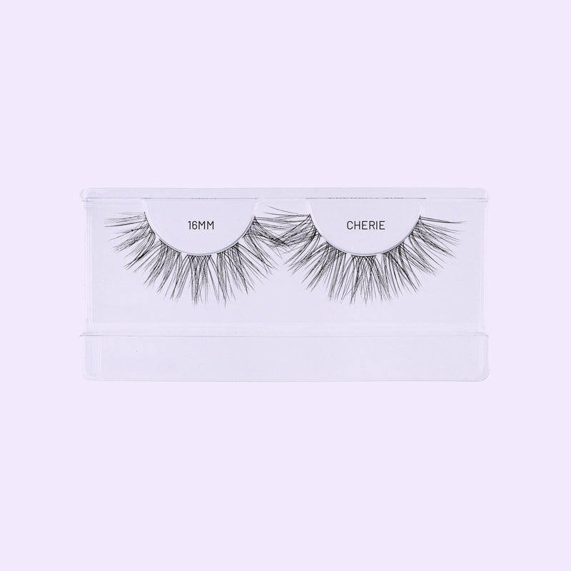 Cherie 16mm NanoSoft lash clusters arranged in a clear Lilac St. tray.